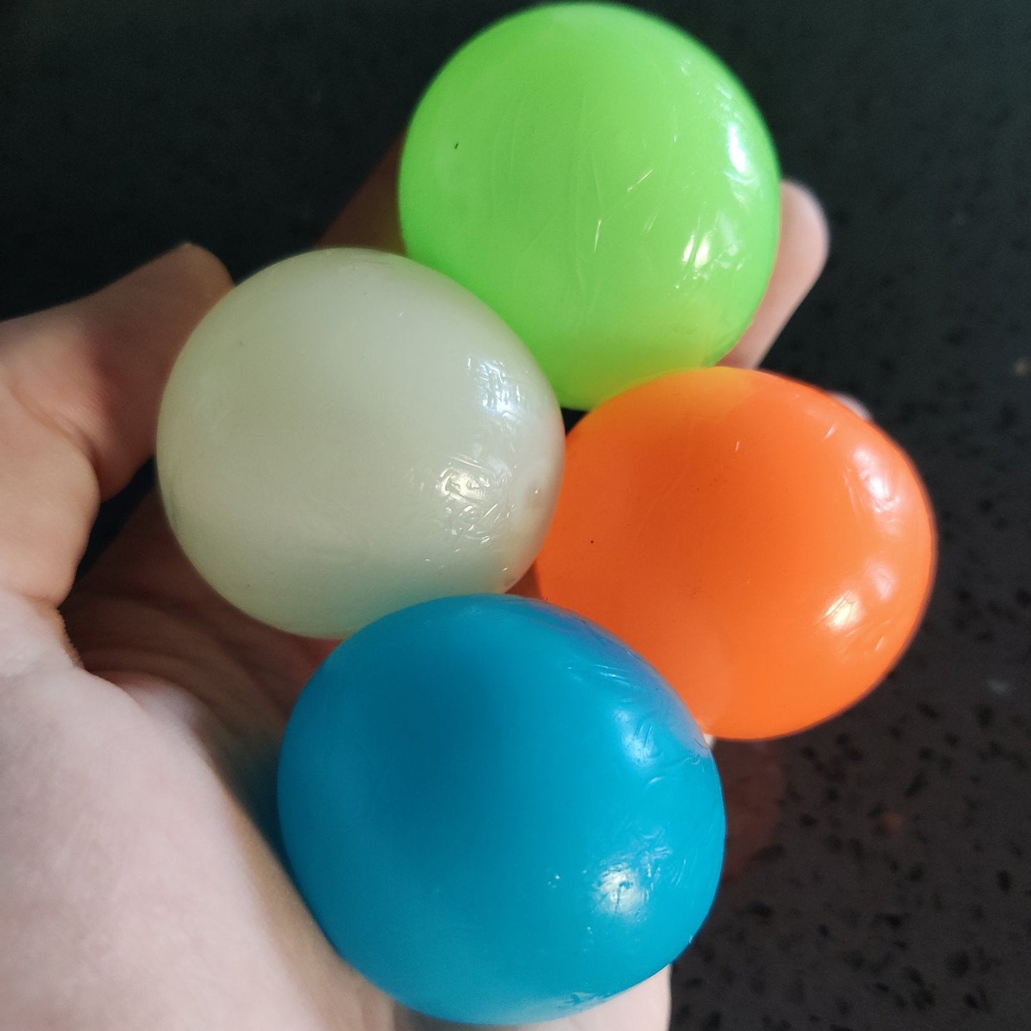 Luminescent Sticky Balls